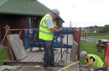 Volunteers mending the disabled access ramp to The Sand Bothy